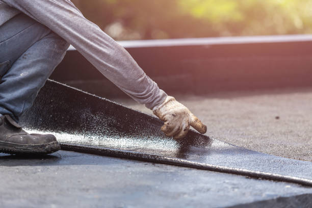 Professional Basement Waterproofing technician working in Greenwood, PA